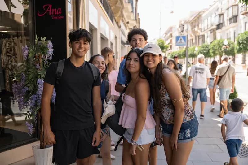 Expanish summer camp students exploring the city together during an outdoor activity.
